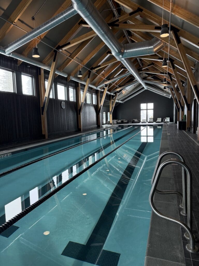 Indoor pool at Miraval Berkshires wellness retreat designed for relaxation and restoration.
